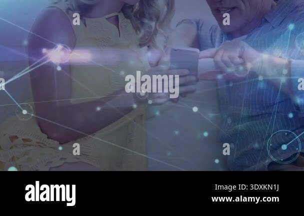 Animated network graphics pulsing while couple tapping phone screen ...