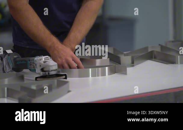 Precision Hand-Bending of Metal 3D Letters in a Professional Signage ...