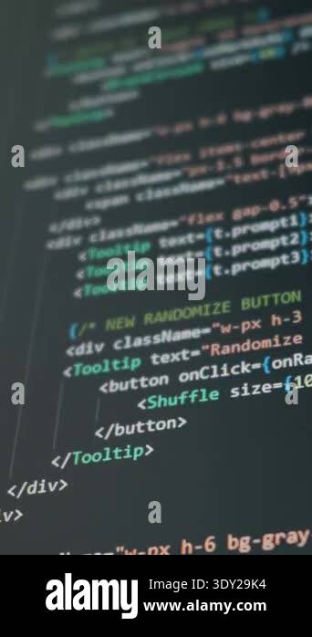 Close up of programming code scrolling on a dark screen during software ...