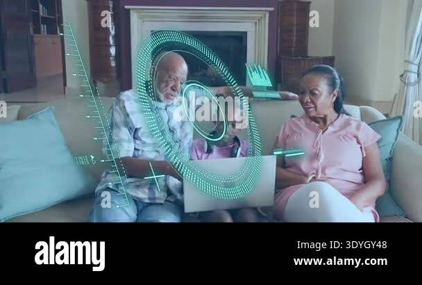 Grandma Using Tech Grandfather shifting laptop to child as grandma leans in, showcasing ...