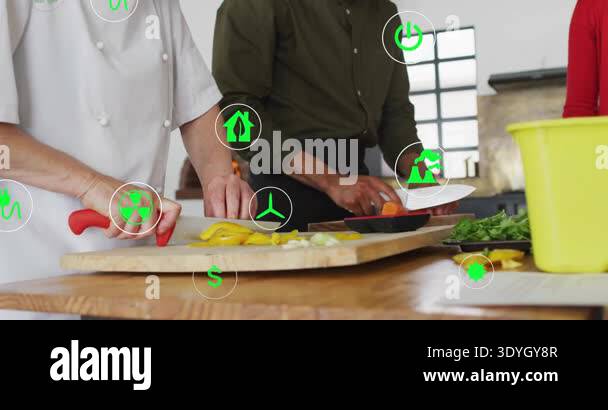 team chopping vegetables on counter as animated recycling and dollar ...