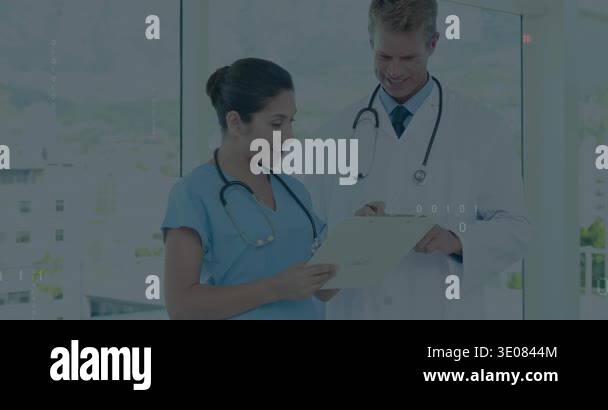 Doctor taking pen, pointing as nurse reading chart in clinic, digital ...