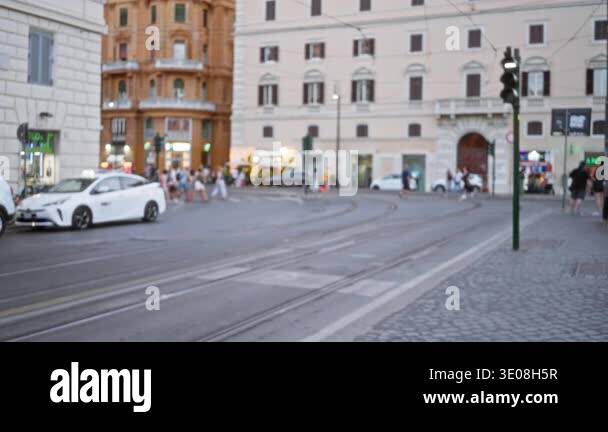 Rome street blurred bokeh background with defocused tram tracks and ...