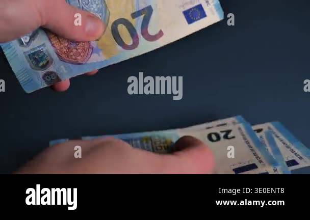 Twenty Euro Bills In Hands Close up Hands Counting Euro Banknotes 4k twenty-euro-bills-in-hands-close-up-hands-counting-euro-banknotes-4k