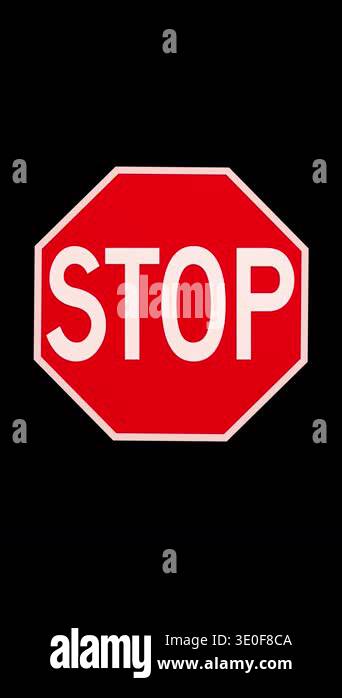 Rotating Stops Looping 3D animation of a rotating STOP sign on black background. High ...