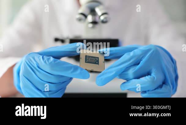 Engineer holds microprocessor in laboratory Stock Videos & Footage - HD ...