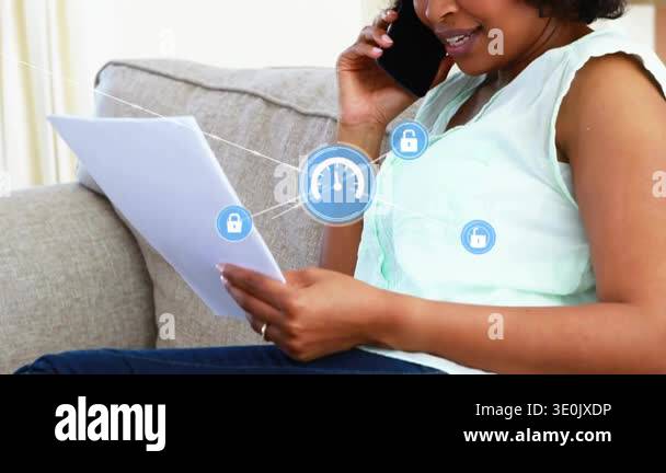 Mid-adult woman holding papers, speaking on phone, call initiating blue ...