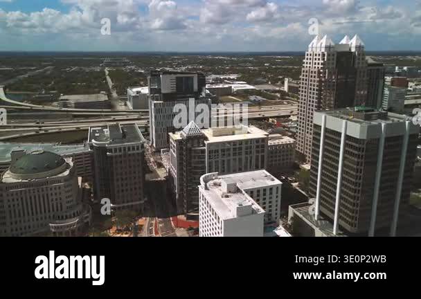 Downtown Orlando aerial with high rise buildings and freeway network ...