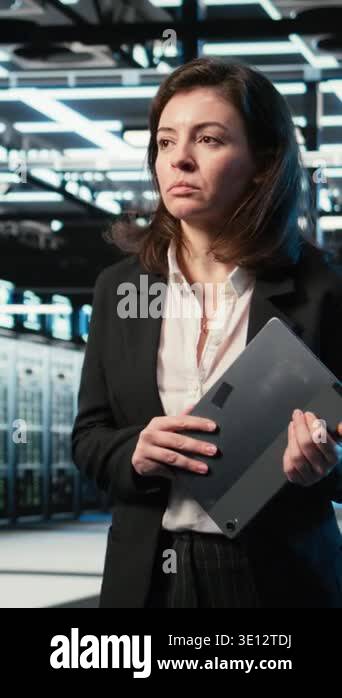 Vertical video Data center female programmer creating digital twin scan ...