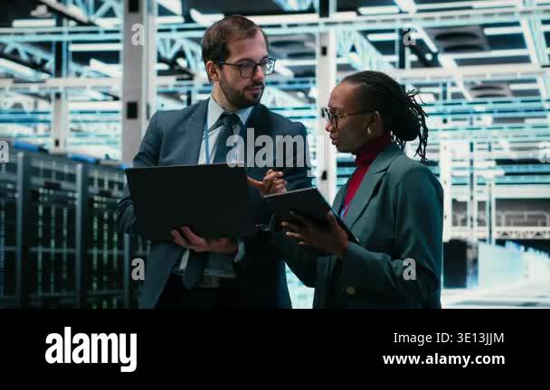 Data center engineering team using AR tech, working together to ...