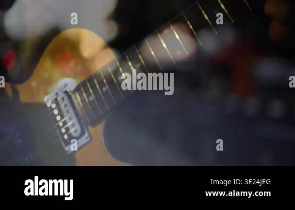 Electric guitar closeup hand entering and picking strings changing ...