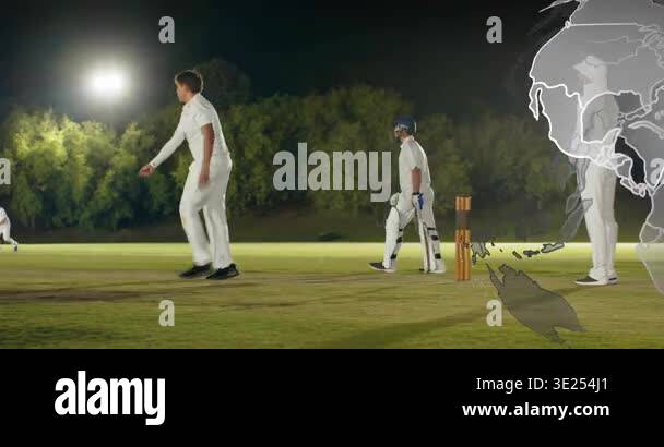 Bowler Running In Bowler running releasing on lit cricket pitch, batsman running to score ...