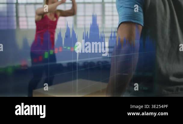 Female trainee performing box jumps on coach signal in gym, building ...