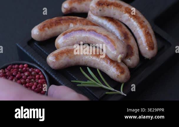 Grilled pork or chicken sausages, smoked fried food with salt and ...