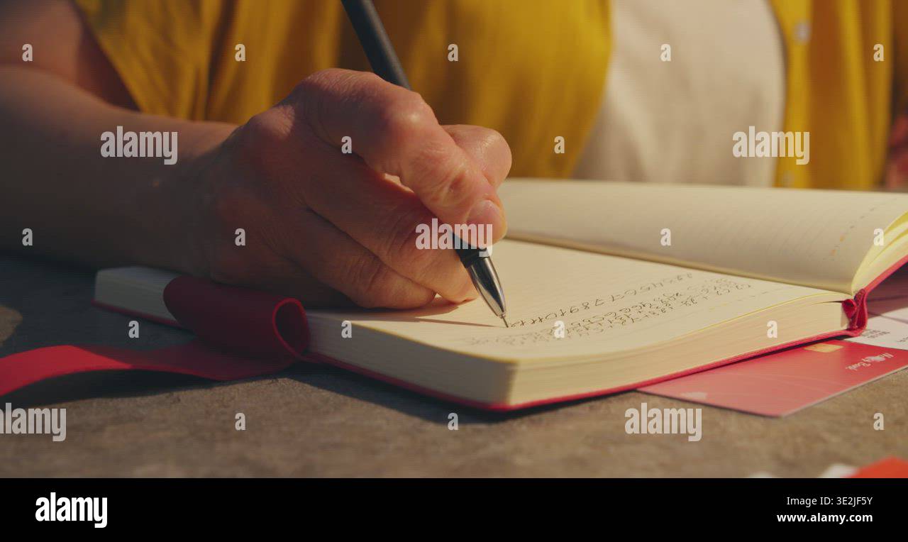 Unrecognizable woman making notes in planner Stock Video Footage - Alamy