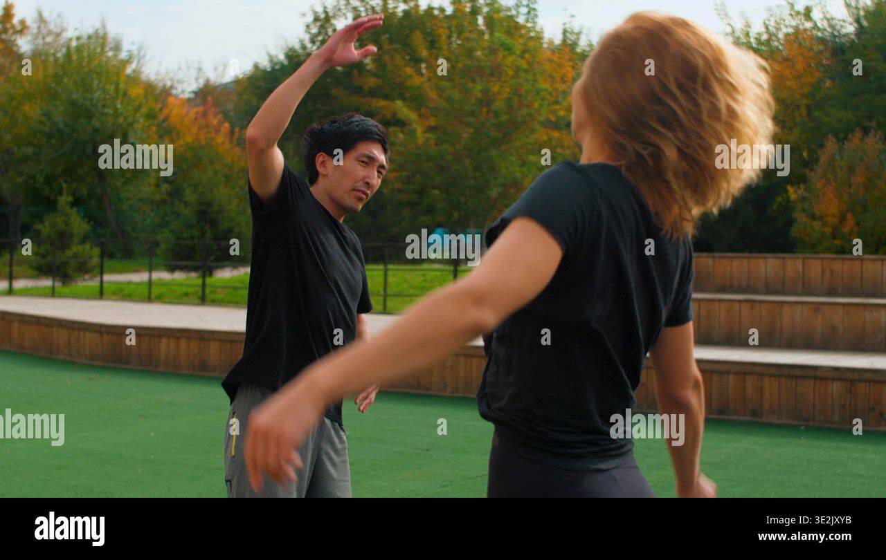man and woman crossfit sports workout on the street Stock Video Footage ...