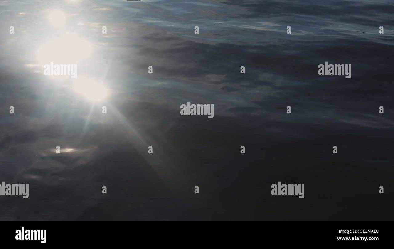 Golden sun rays on seawater Stock Video Footage - Alamy