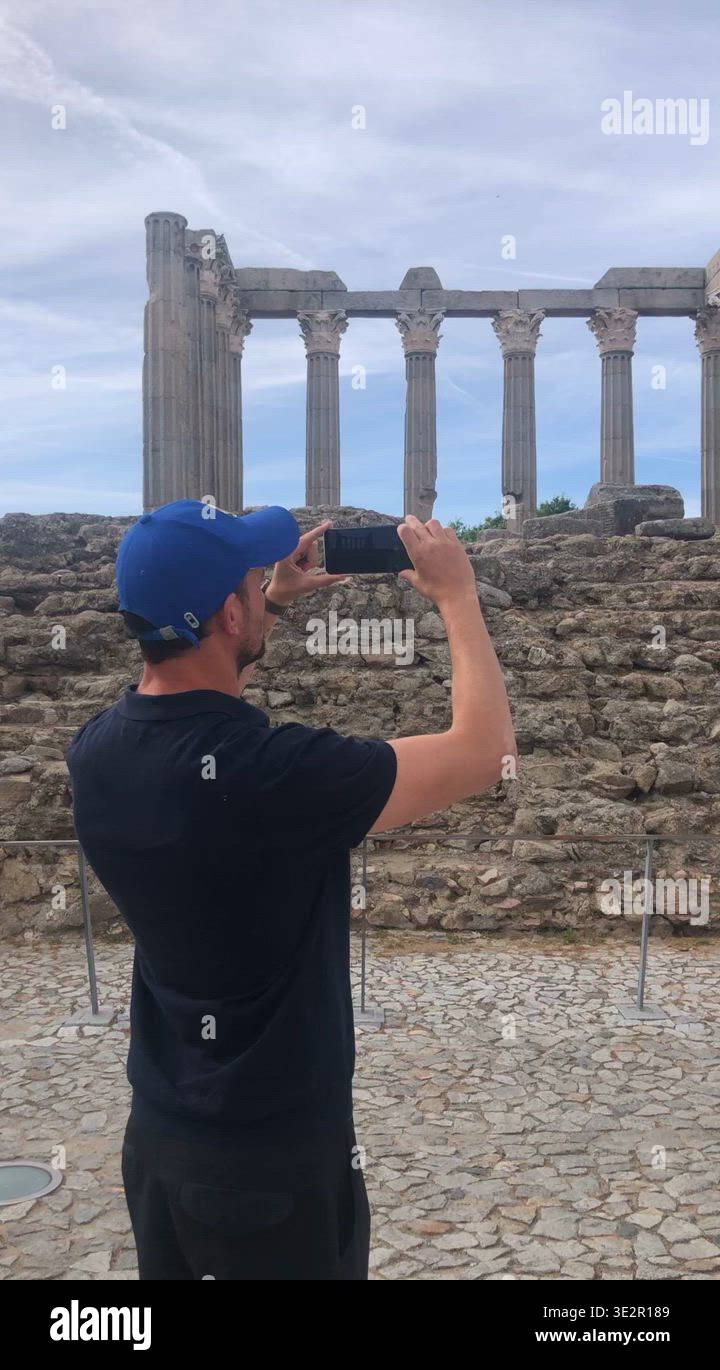 UGC tourist photographing a Roman temple Stock Video Footage - Alamy