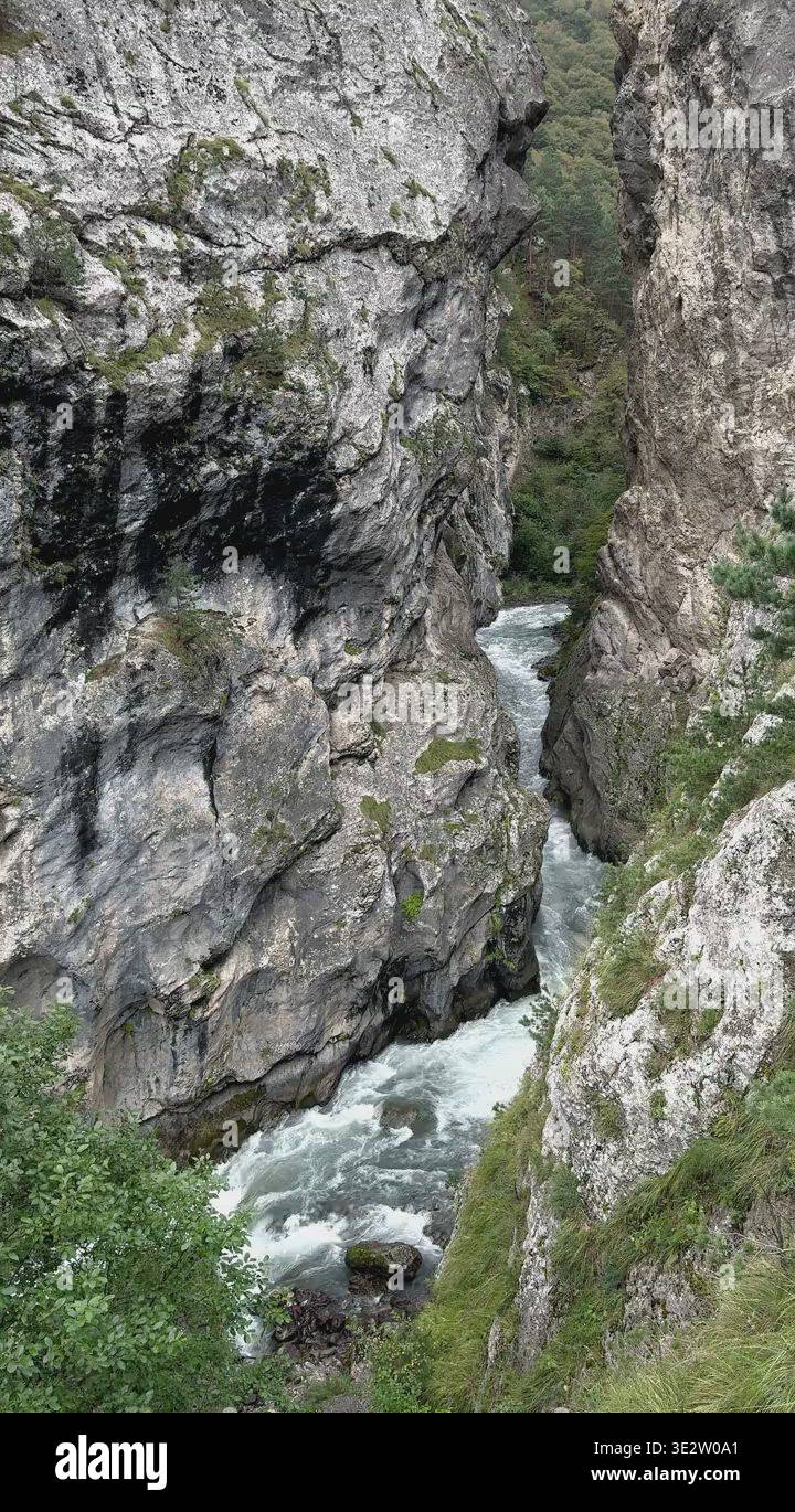 Mountain Chasm With Rushing Rive Rushing river flowing through narrow mountain gorge Stock Video Footage ...