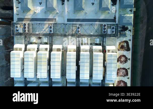 High angle aerial drone view of a large scale futuristic data center in ...