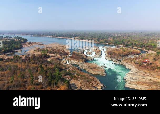 Khone Rivers Scenic aerial view of Khone Phapheng Falls with cascading water, rocky ...