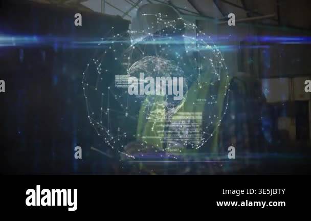 Industrial worker inspecting tablet in factory, with holographic ...