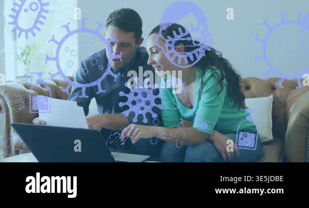 Man holding paper, woman pointing at laptop on sofa, reviewing health ...