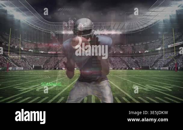 Ball carrier getting tackled in stadium under lights, showing ...