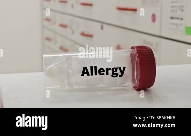 ALLERGY plastic box of tablets on hospital pharmacy shelf; clinical ...
