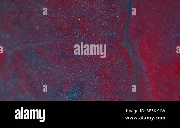 Splash paint. Sparkling texture. Defocused red blue purple color bright ...