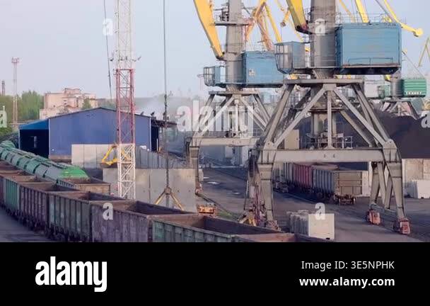 Industrial Port Cranes Loading Coal Wagons, Giant Gantry Structures ...