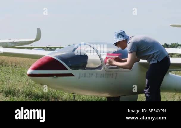 Glider pilot getting ready for the flight on motorless fixed-wing ...
