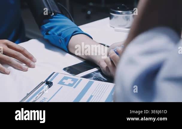 close up of doctor hands holding a pen to make patient Stock Video ...