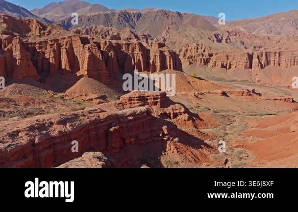Aerial view captures majestic eroded sandstone mountains in Kyrgyzstans ...