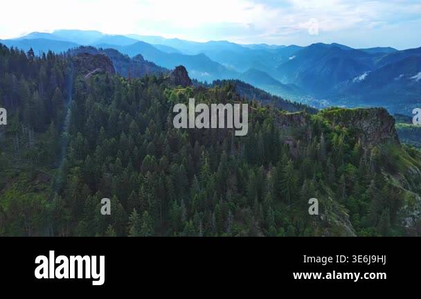 High rocky wild mountain range of Rhodope Mountains covered with green ...