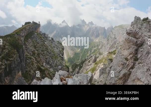 Timelapse zoom in jagged peaks of Cadini di Misurina rise above deep ...