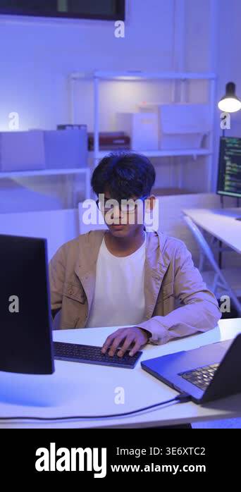 Focused Male Programmer, Software Developer working on Desktop Computer ...