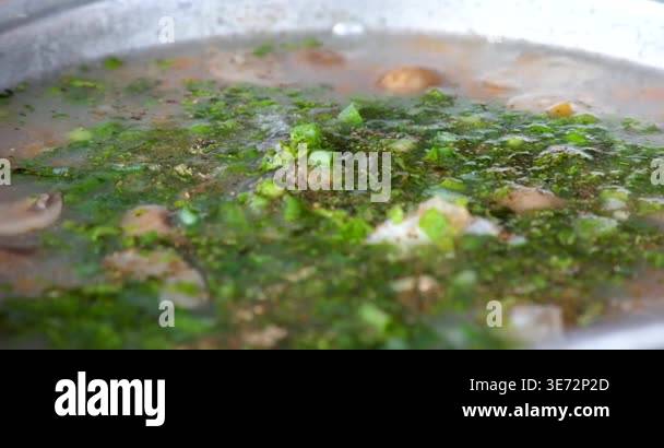 Vietnamese style hot pot soup prepared step by step with rice carrots ...