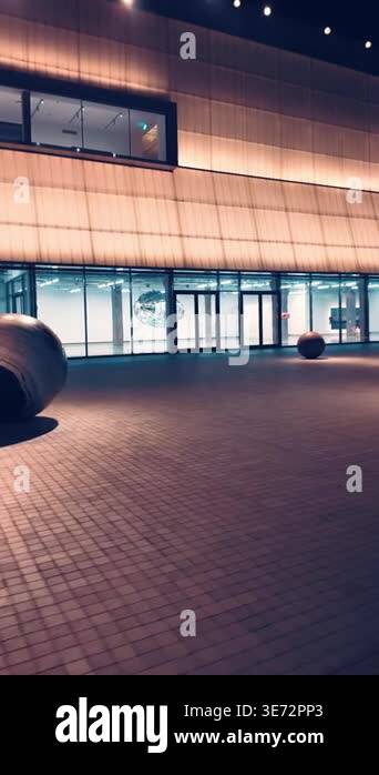 Illuminated marble sphere installation at museum plaza in Bangkok Dib ...