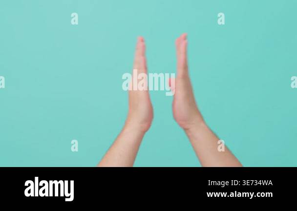 Two hands facing each other against background Stock Video Footage - Alamy