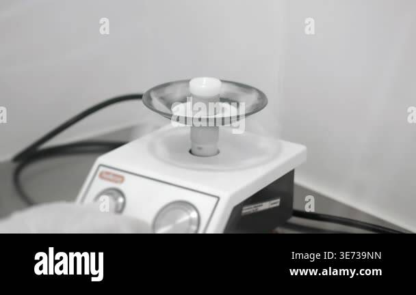 Test tube mixing on laboratory vortex mixer during sample preparation ...