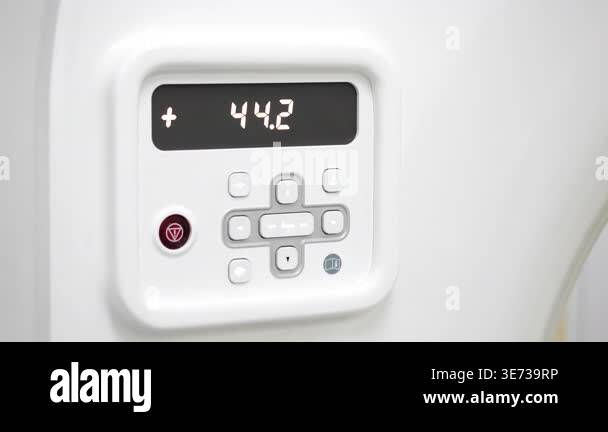 Close up of medical scanner control panel with digital display and ...