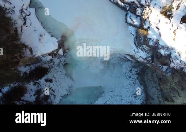 Aerial top down flyover of Isaacs Icefall along the David Thompson ...