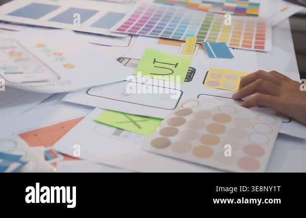 designer working in office with color swatches Stock Video Footage - Alamy