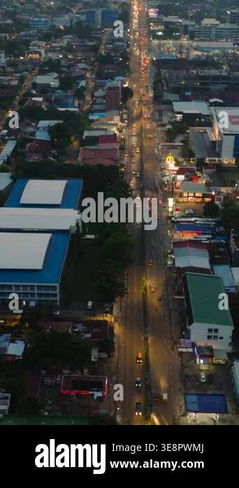 City at night in Davao with busy highway and lights flicker. Davao City ...