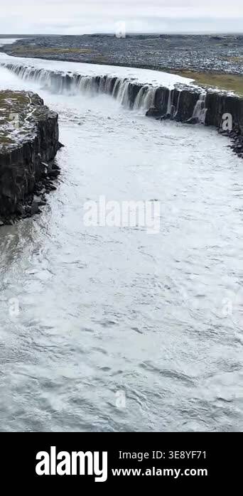 Aerial drone view of Dettifoss waterfall along the Jokulsa a Fjollum ...