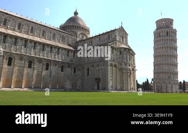 Pisa Cathedral and Leaning Tower stand in Italy, celebrated marble ...
