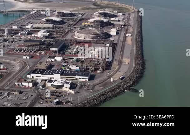 Expansive aerial perspective of a coastal liquefied natural gas ...