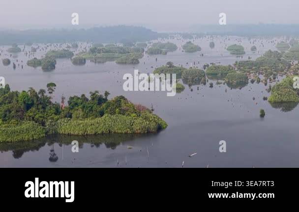 Aerial view shows calm waters surrounding numerous green islands at ...