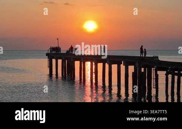 Segenting, Johor, Malaysia - Mar 07 2026: People silhouetted on a ...